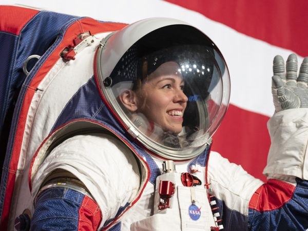 Kristine Davis, a spacesuit engineer at NASA’s Johnson Space Center, wearing a ground prototype of NASA’s new Exploration Extravehicular Mobility Unit (xEMU), is seen during a demonstration of the suit, Tuesday, Oct. 15, 2019 at NASA Headquarters in Washington. The xEMU suit improves on the suits previous worn on the Moon during the Apollo era and those currently in use for spacewalks outside the International Space Station and will be worn by first woman and next man as they explore the Moon as part of the agency’s Artemis program. Photo Credit: (NASA/Joel Kowsky)