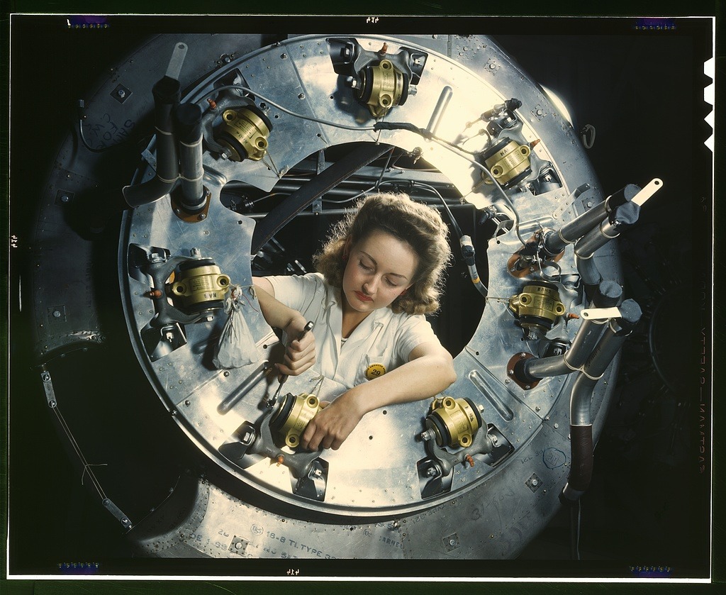 Part of the cowling for one of the motors for a B-25 bomber is assembled in the engine department of North American [Aviation, Inc.]'s Inglewood, Calif., plant digital file from original transparency. Palmer, Alfred T., photographer. Created / Published 1942 October. In honor of Women's History Month.