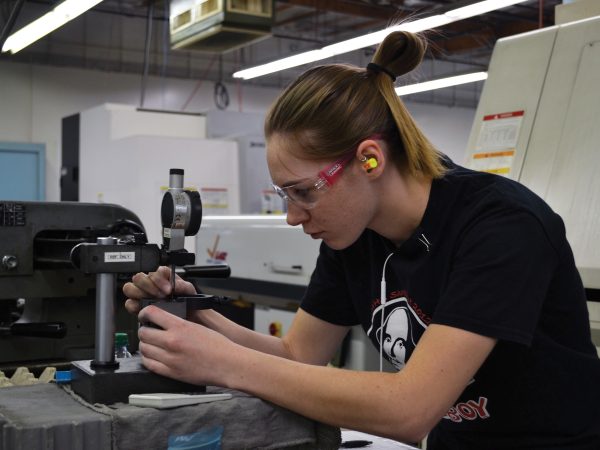 Director's Message — Building Robust Collaboration At Community Colleges ATE's MATEC Networks National Resource Center A technician participating in a MATEC Networks National Resource Center professional development course checks a critical dimension.